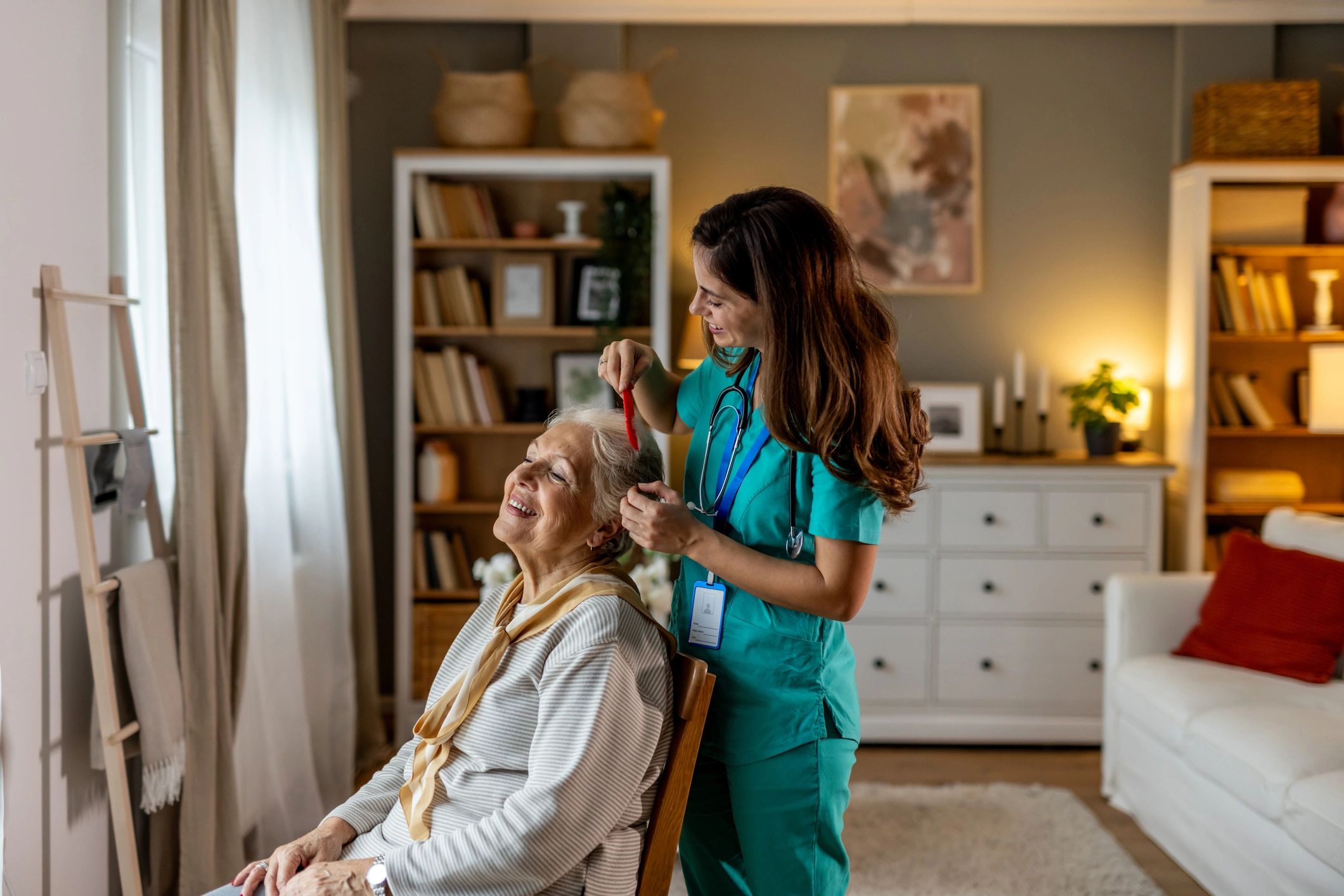 Caregiver supporting an older adult at home